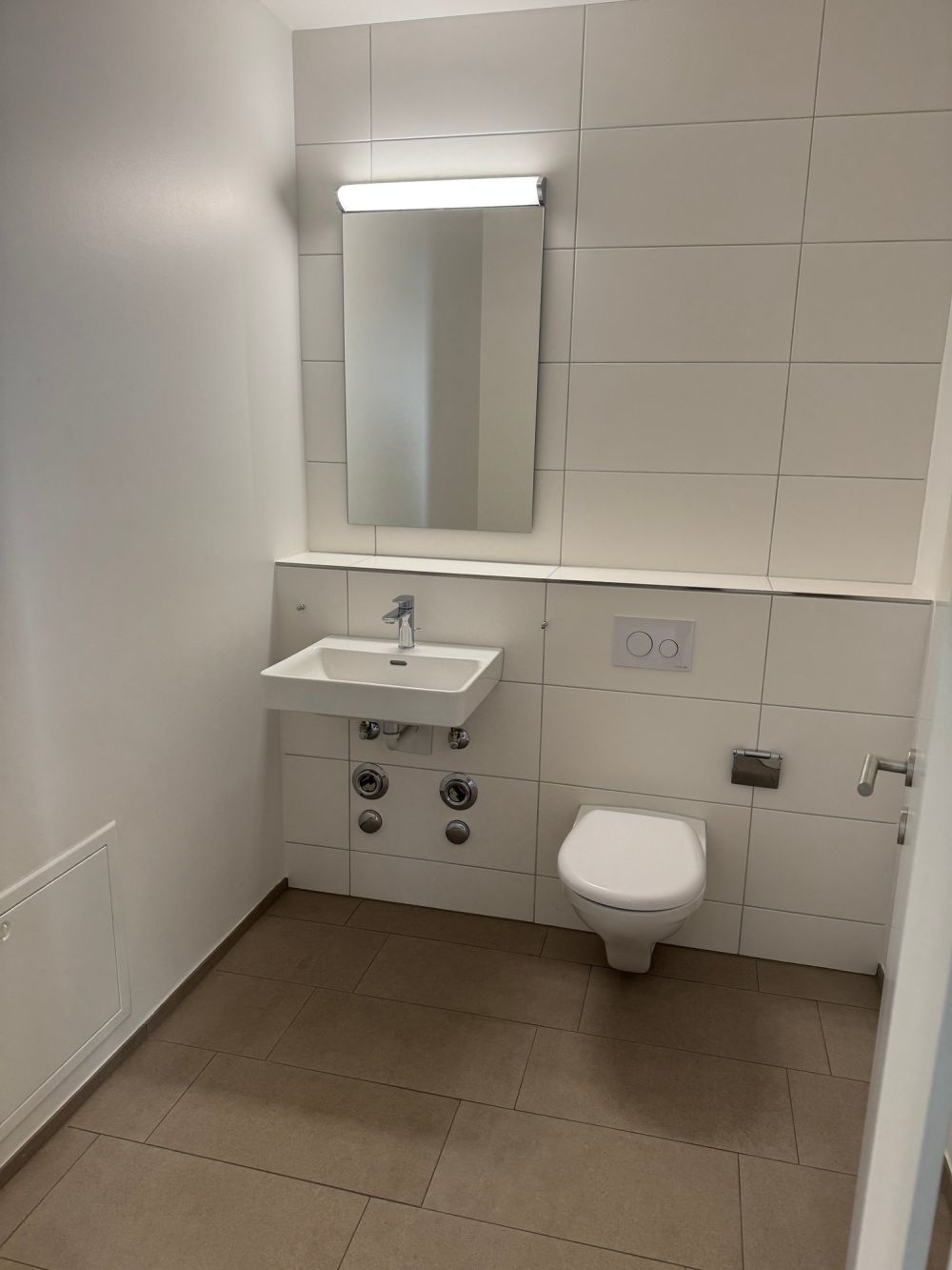 Zentralgelegene, moderne 2.5 Zimmerwohnung im EG in Pfeffingen - WC