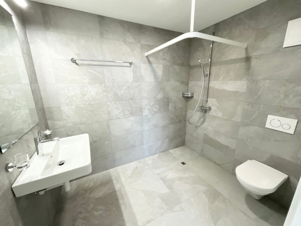 Appartements neufs de 2.5 pièces avec loggia - Confort moderne, durabilité et qualité de vie au coeur du village - Bild 4