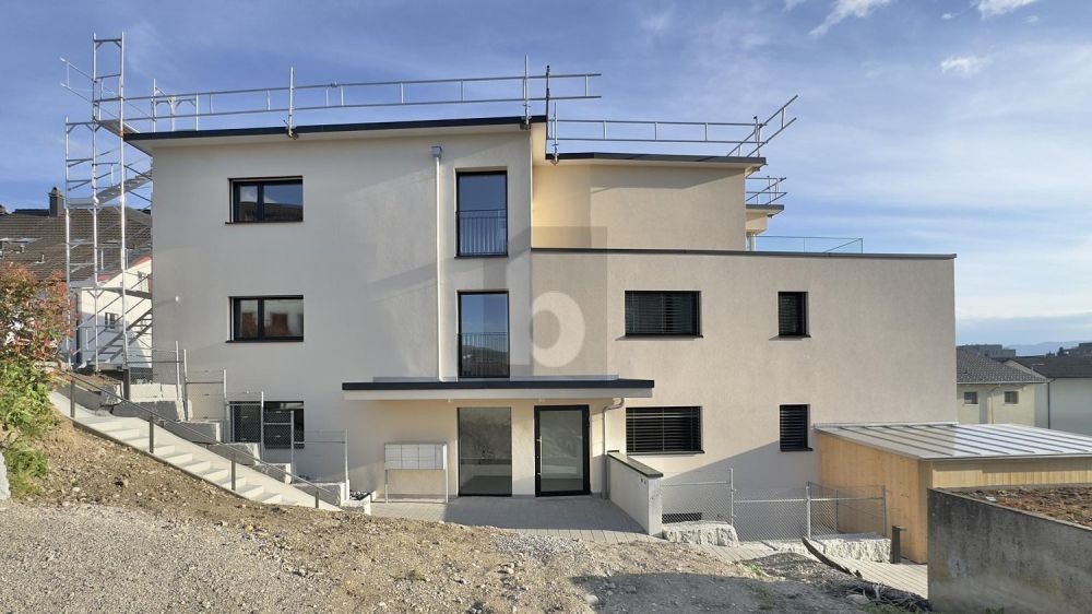 MODERNER NEUBAU AN ZENTRALER LAGE - Bild 1