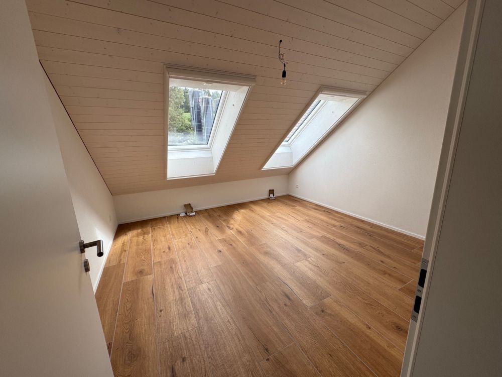 Top Dachwohnung - Erstbezug! - Zimmer 01