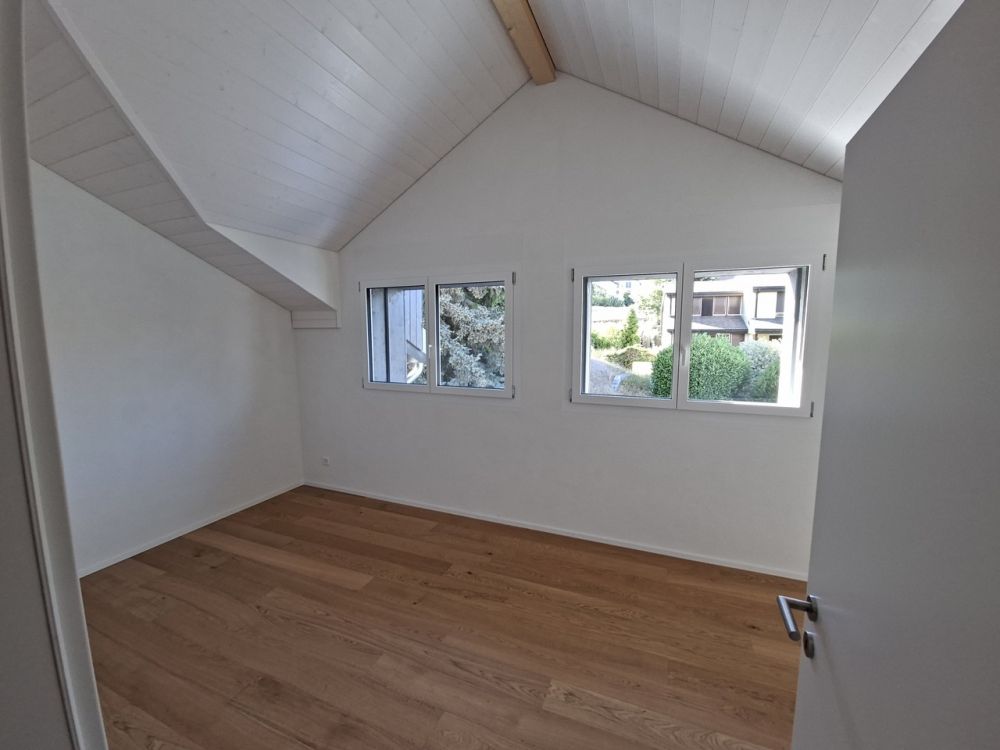 Grand appartement de 4,5 pièces sous les combles et proche de la gare - Bild 2