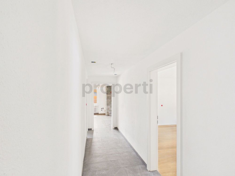 Moderne 4.5-Zimmer-Wohnung mit Balkon und Kamin in Mels - Image 4