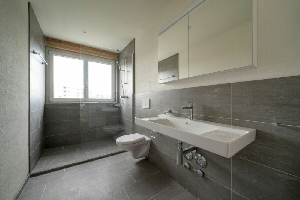 Exklusive 4.5-Zimmer-Attikawohnung mit ca. 163 m² Sonnenterrasse - Erstbezug im Neubau - Bild 13