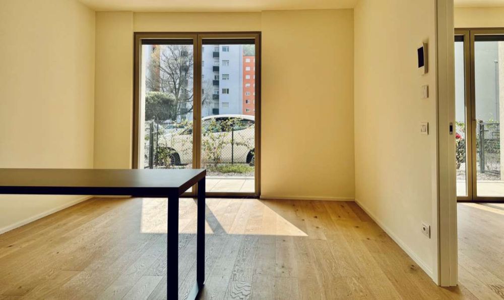 Esclusivo 2.5 locali di nuova costruzione con giardino privato e doppi - Bild 3