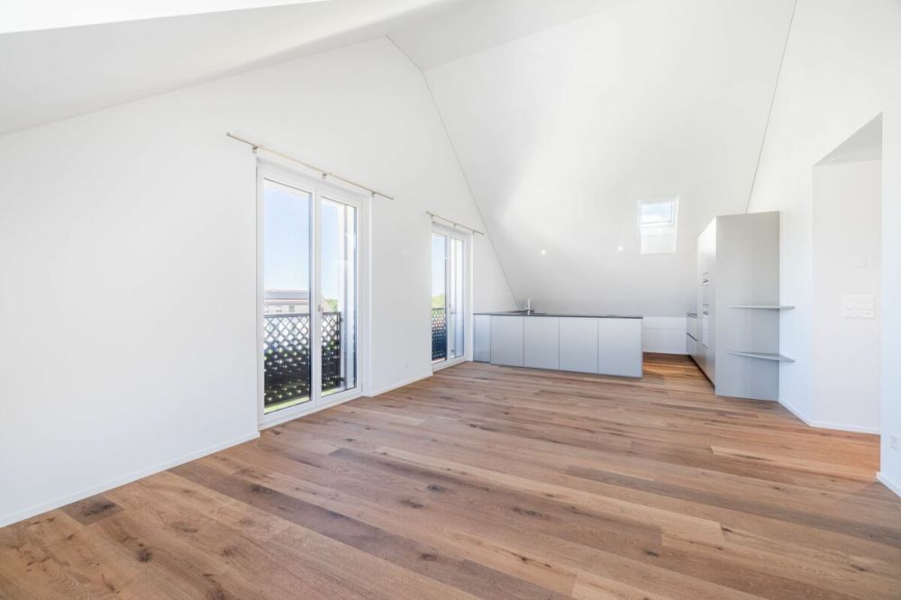 NEUBAU: Dachwohnung mit 4.5-Zimmern und Aussicht ins Grüne - Bild 2
