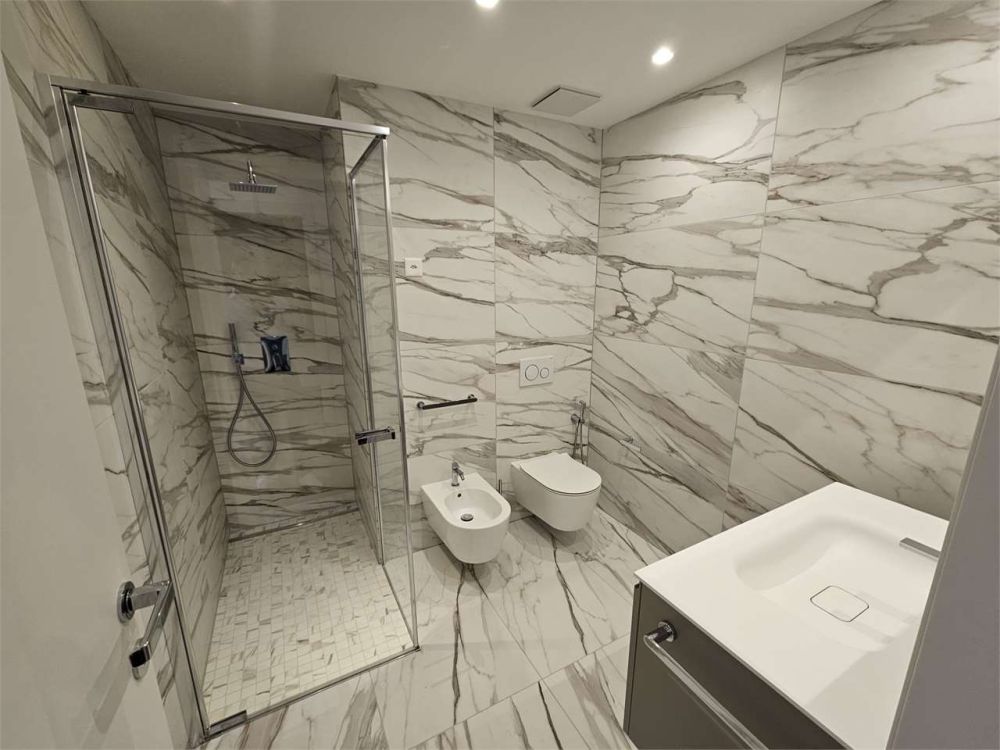 Pregassona, appartamento 4.5 locali con giardino privato - Bild 13