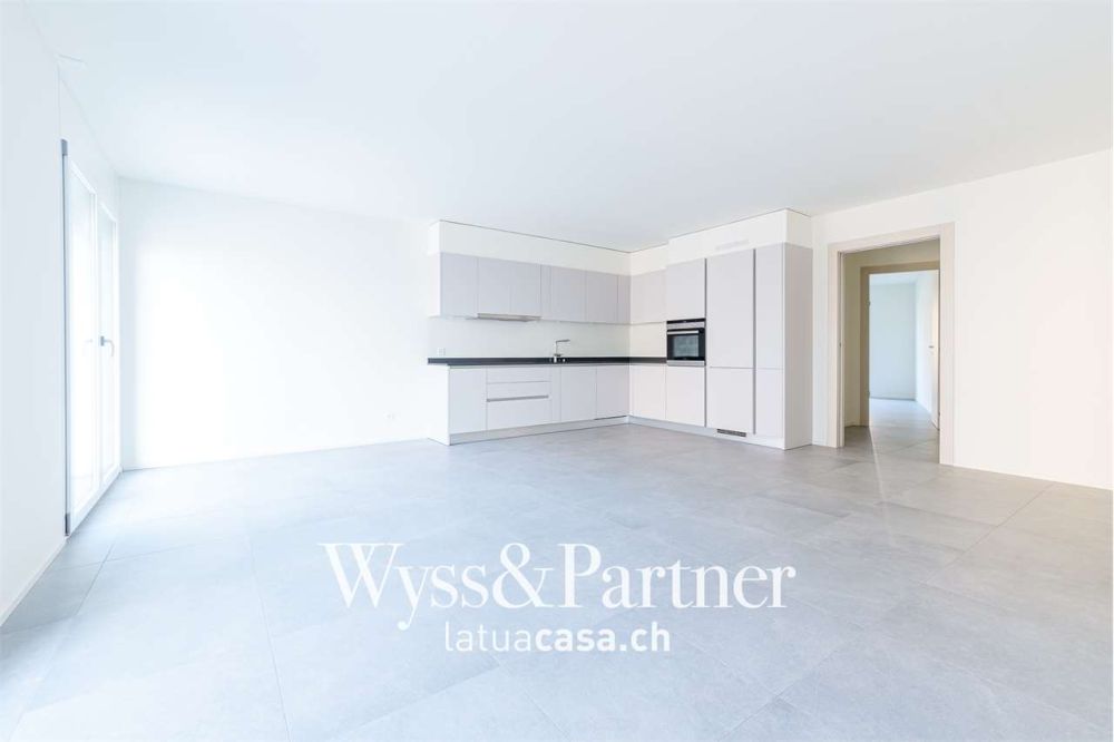 Claro, nuovo appartamento 3.5 con giardino - Bild 1