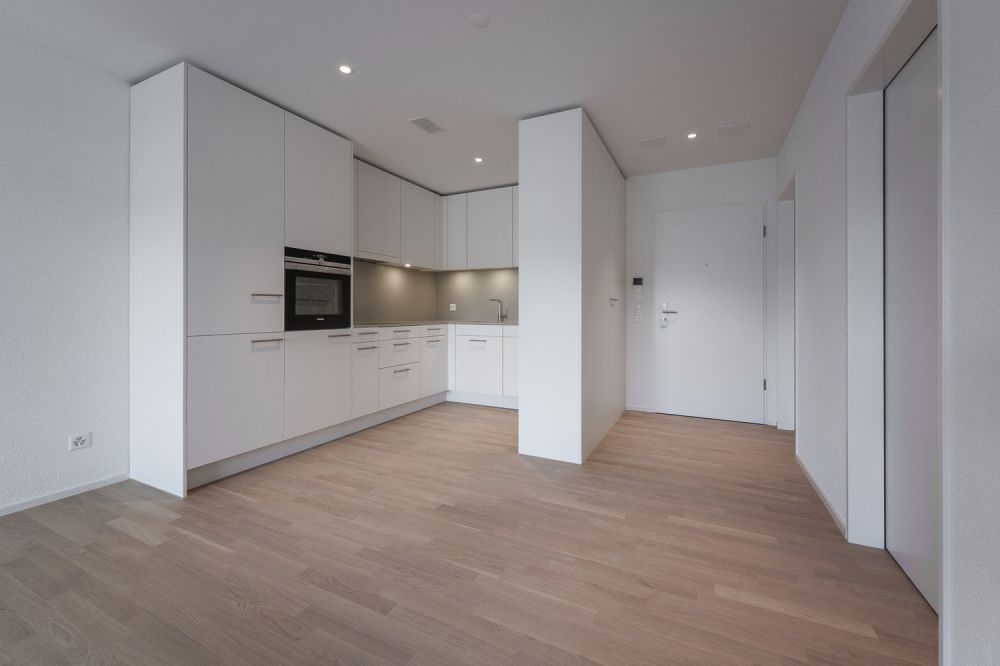 Moderne 1.5-Zimmer-Neubauwohnung im Römerpark - Küche
