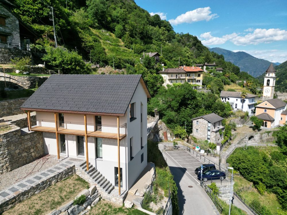 Casa unifamiliare con terreno e posti auto coperti - Bild 13