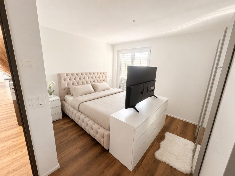 Moderne 3.5-Zimmer-Neubauwohnung mit BORA-Küche, zwei Bädern und sonnigem Balkon - Bild 5