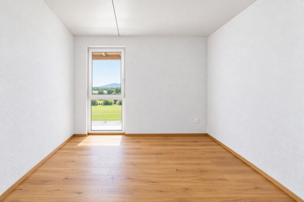 attraktive und grosszügige 2.5-Zimmer Neubauwohnungen zu vermieten - Dachgeschoss - Zimmer KI generiert