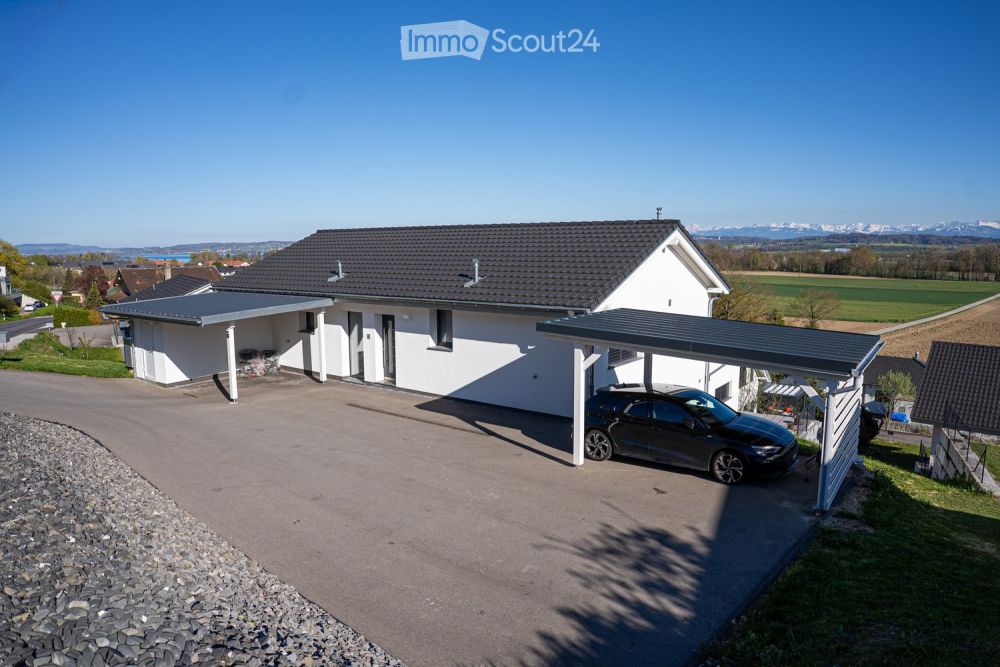 Exklusiv 5,5 Zimmer-Wohnung in Villa mit Blick auf den See und die Berge - Bild 11