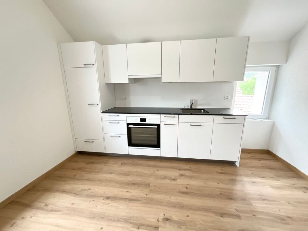 Charmantes 3.5-Zimmer-Neuwagenwohnung mit großer Terrasse - Bild 1