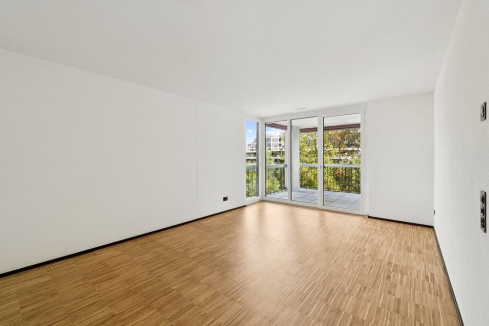 Attraktive Neubauwohnung an bester Lage direkt an der Glatt - Wohnzimmer