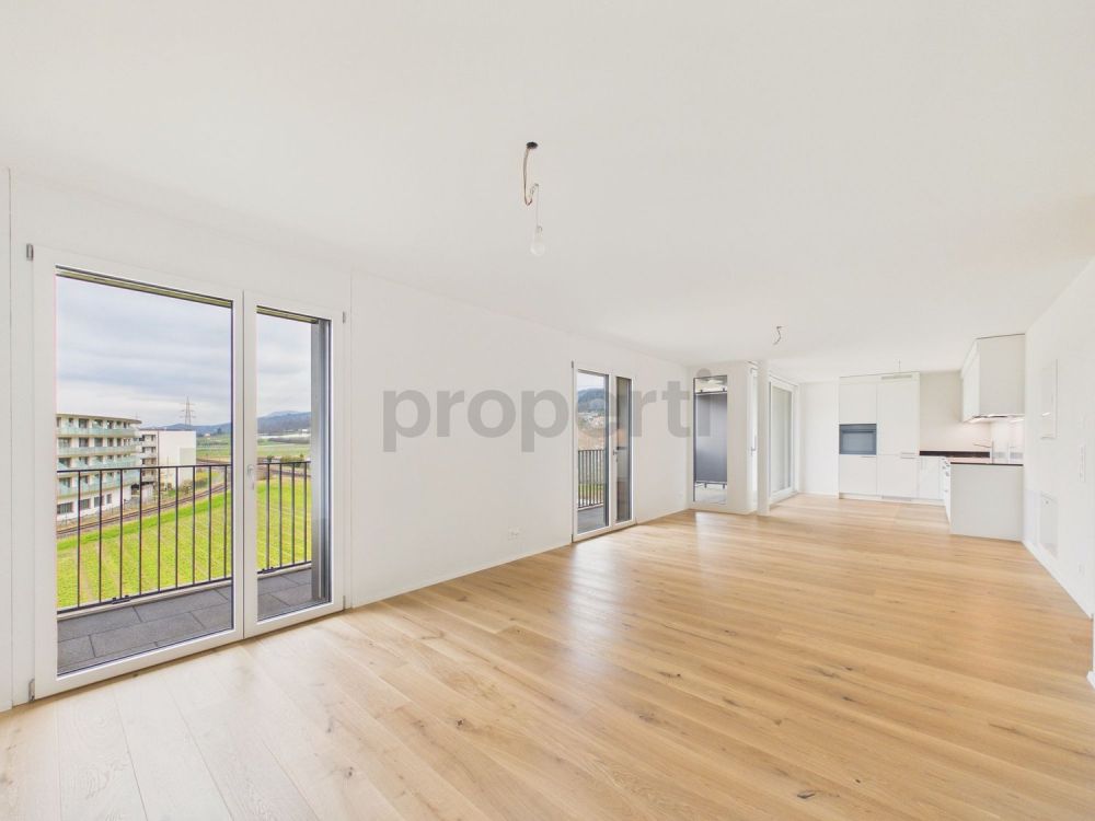 1.5-Zimmer-Neubau-Wohnung mit Balkon in Buchs ZH (mit möglicher Wandlung zu 2.5) - Image 1