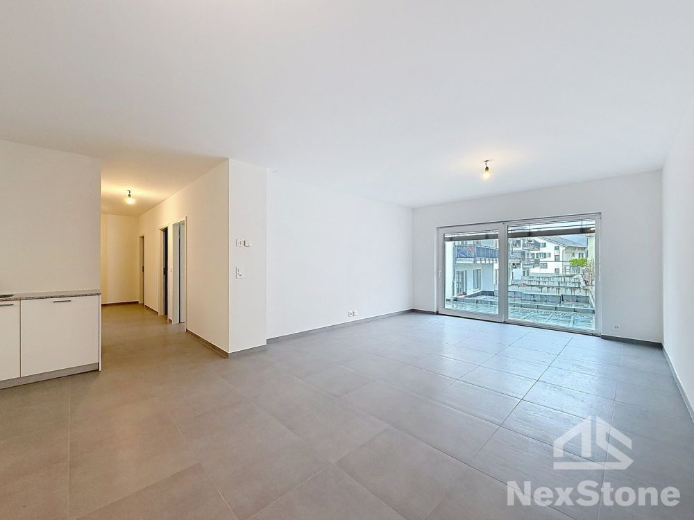 4.5 pièces neuf avec terrasse + parking couvert - Bild 1
