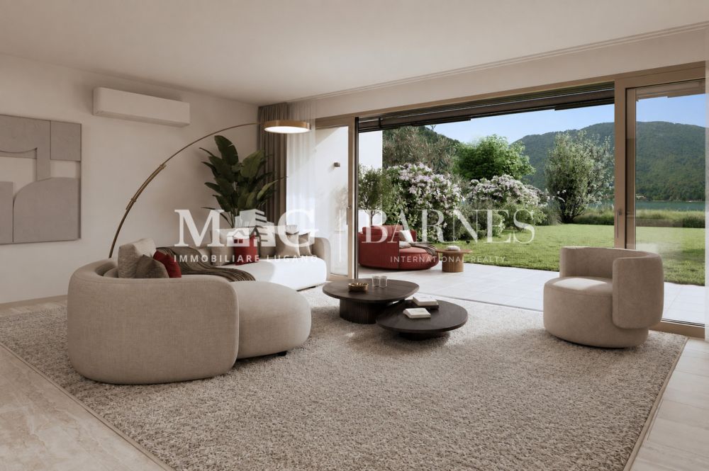 Villa di testa fronte lago con giardino privato a Caslano - Bild 1