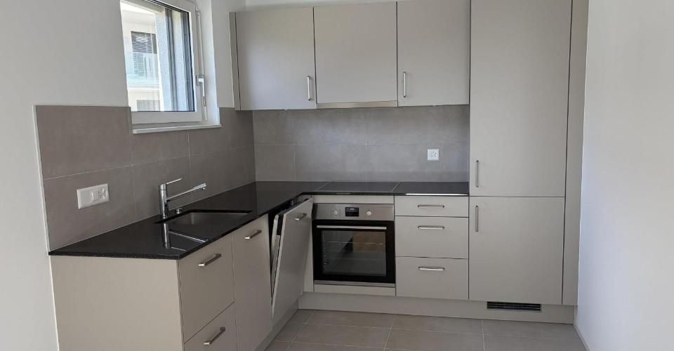 Magnifique appartement de 2.5 pièces au 1er étage d'un immeuble neuf avec balcon - E102 - Appartement 2.5 pièces - image - 1
