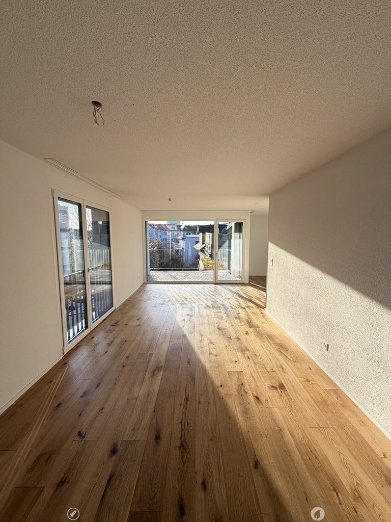 Exklusive 4.5-Zimmer-Neubauwohnung im 2. Obergeschoss ca. 111.6 m2 BGF - Wohnzimmer_5.0.jpeg