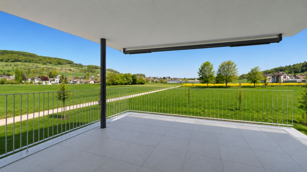 Erstbezug mit Aussicht stilvoll wohnen im Grünen - Bild 1