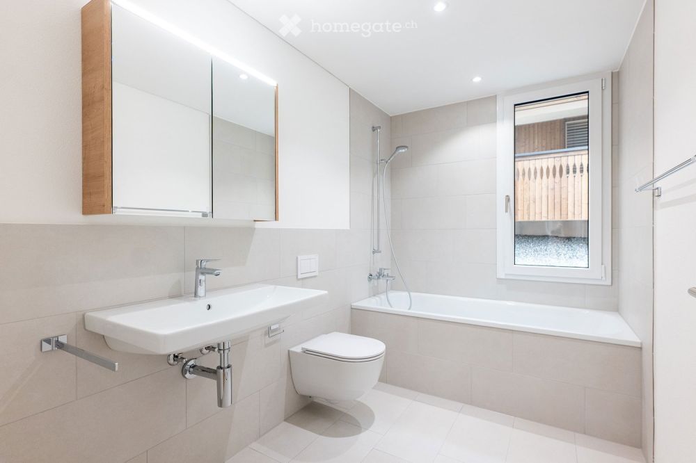 Moderne 5.5 Zimmer Eigentumswohnung mit grossem Sitzplatz - Bild 11