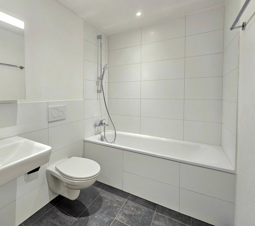 Moderne 2.5 Zimmerwohnung Parterre "Neubau" - Bild 7