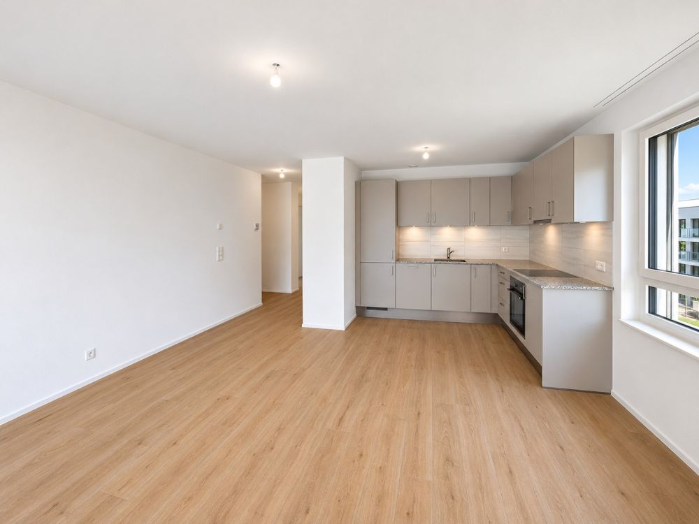 Appartement de 2.5 pièces avec grand balcon au coeur de Greenparc - Bild 1