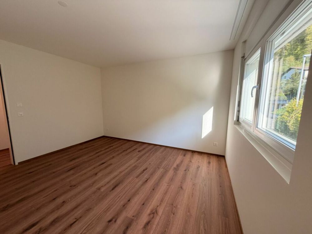 Erstbezug: sonnige 3.5 Zimmer-Wohnung mit Aussicht an ruhiger Lage - Schlafzimmer