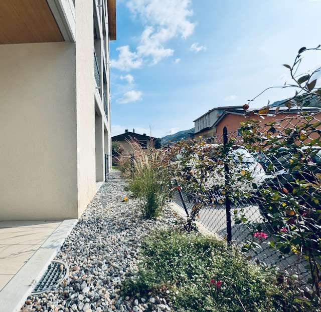 Nuovo e moderno 2.5 locali con giardino - Bild 9
