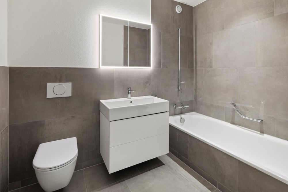 Erstvermietung - Ihre 4.5-Zimmer-Traumwohnung für die ganze Familie - Badezimmer mit Badewanne