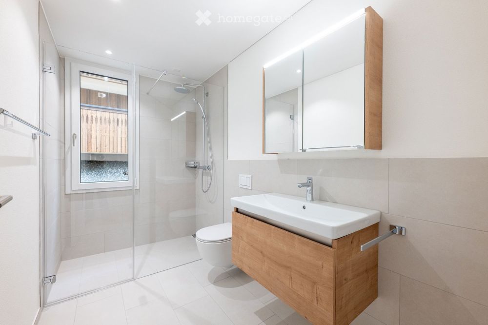 Moderne 5.5 Zimmer Eigentumswohnung mit grossem Sitzplatz - Bild 5