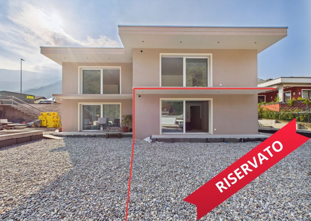 Moderno appartamento 2.5 locali con giardino e vista panoramica a Rivera - Bild 1