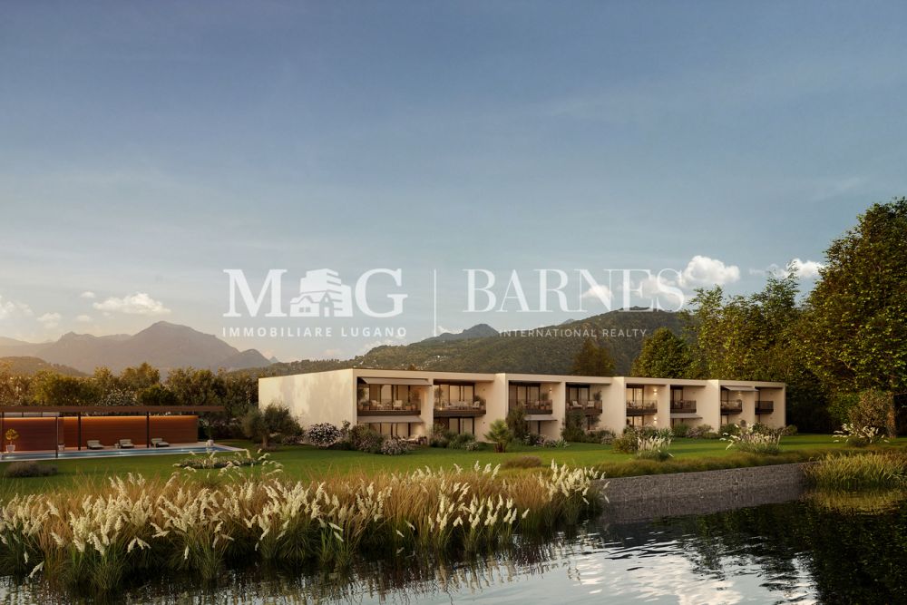 Villa fronte lago con giardino privato a Caslano - Bild 7
