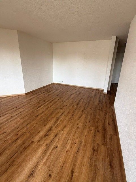 Erstvermietung: Stilvolle, hochwertige Wohnung neu bezugsbereit! - Wohnzimmer.png