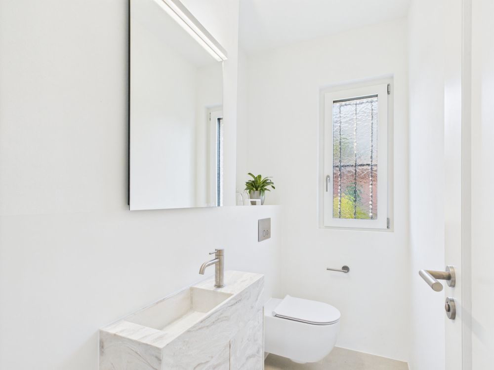 Elegante Erdgeschosswohnung mit Gartenparadies in Ascona – Neubauqualität und luxuriöse Ausstattung - Bild 6