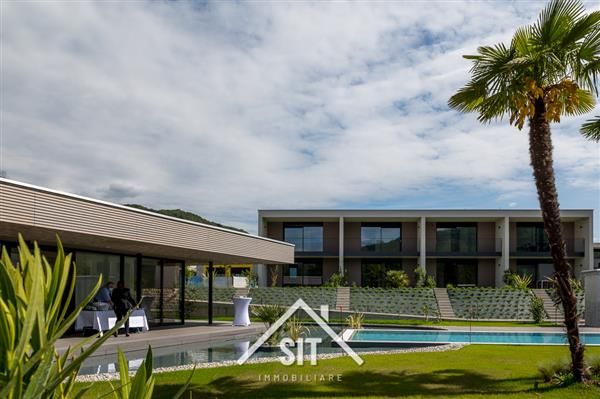 Caslano: Casa a schiera 2.5 locali - Esterno