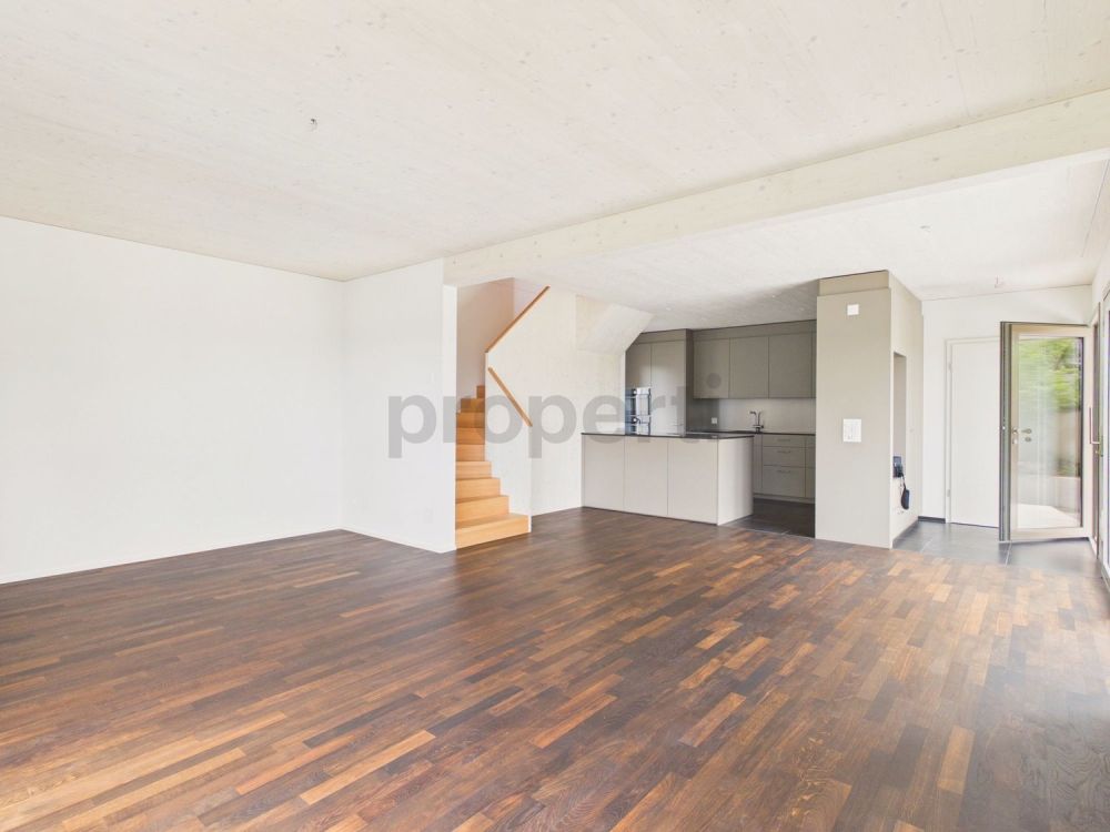 Stilvolles Neubau-Einfamilienhaus in nachhaltiger Holzbauweise mit Naturgarten und Alpenblick - Image 2