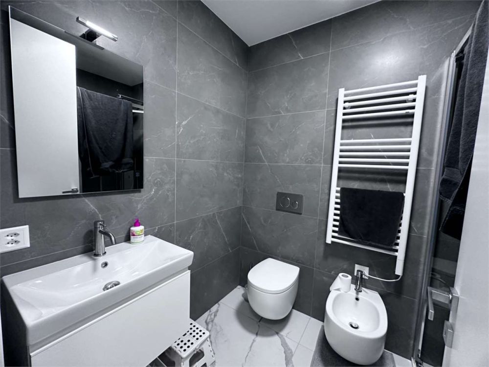 Nuovo e moderno 2,5 locali con terrazzo - Bild 12