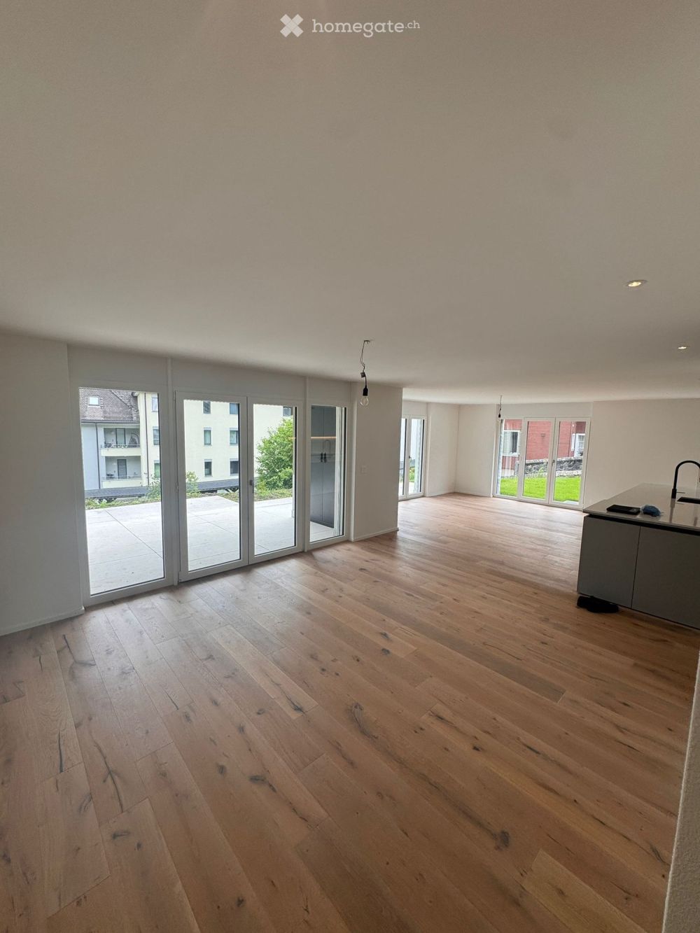 Moderne 4.5-Zimmer-Gartenwohnung in Gersau mit Bergblick und Seenähe - Bild 1