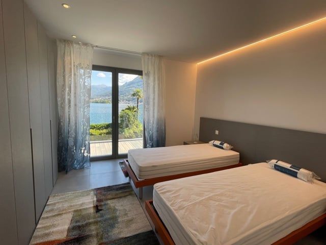 PARADISO FRONTE LAGO - 4,5 LOCALI DI NUOVA COSTRUZIONE ARREDATO - Bild 8