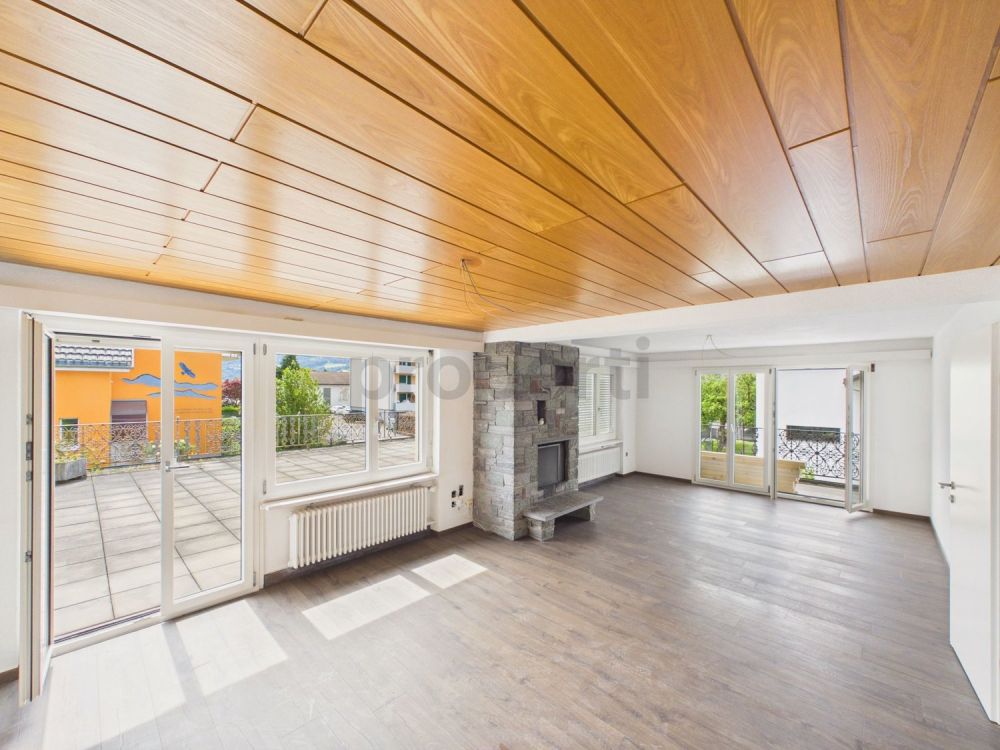 Moderne 4.5-Zimmer-Wohnung mit Balkon und Kamin in Mels - Image 1
