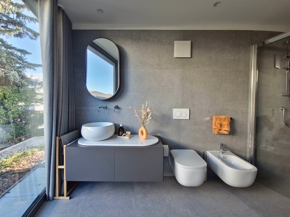 ESCLUSIVO 4.5 LOCALI AL PIANO TERRA CON GIARDINO PRIVATO A GENTILINO - Bild 11