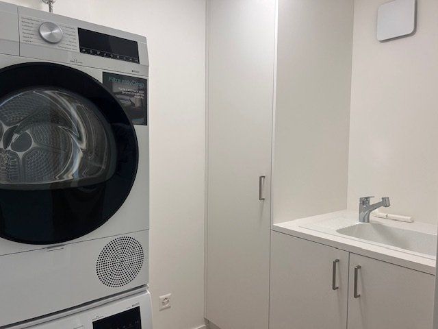 Logement 3.5 pièces au rez-de-chaussée - Espace buanderie