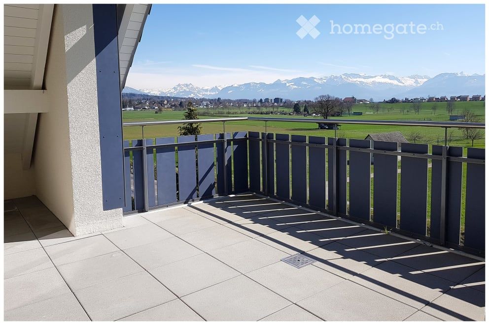 Sehr grosse, exklusive Wohnung mit modernem Einfamilienhaus-Charakter - Unverbaubarer Südblick in die Berge