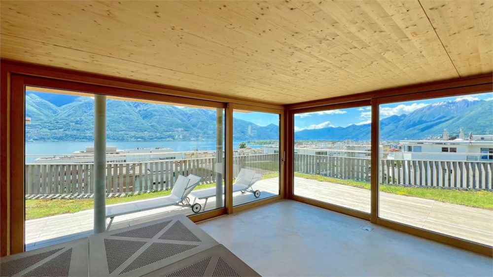 MINUSIO - Nuovo appartamento con grande giardino e vista lago - Bild 13