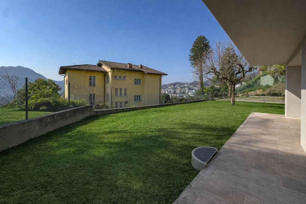 Nuovo 3.5 locali vista lago con giardino a Massagno - Bild 4