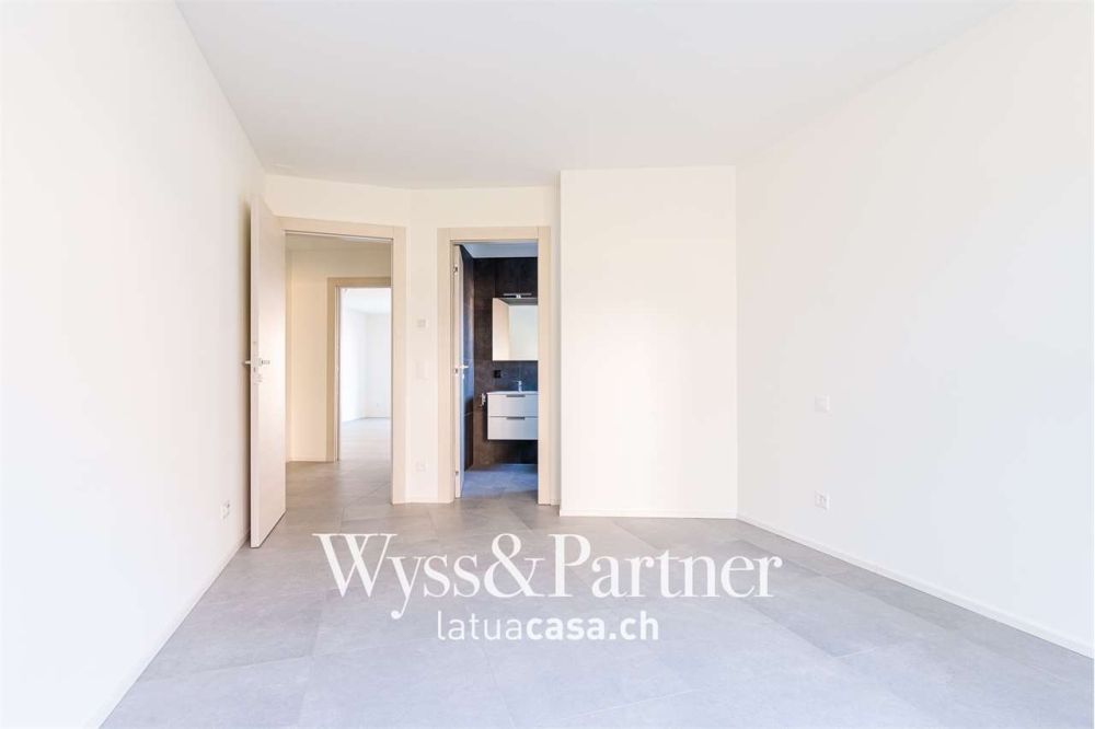 Claro, nuovo appartamento 3.5 con giardino - Bild 4