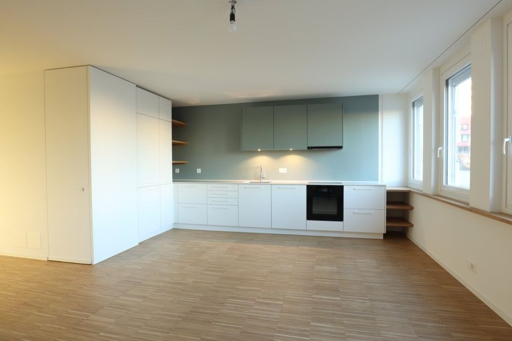 Helle Wohnung mit Gartensitzplatz und Waschturm nach Erstbezug - Küche