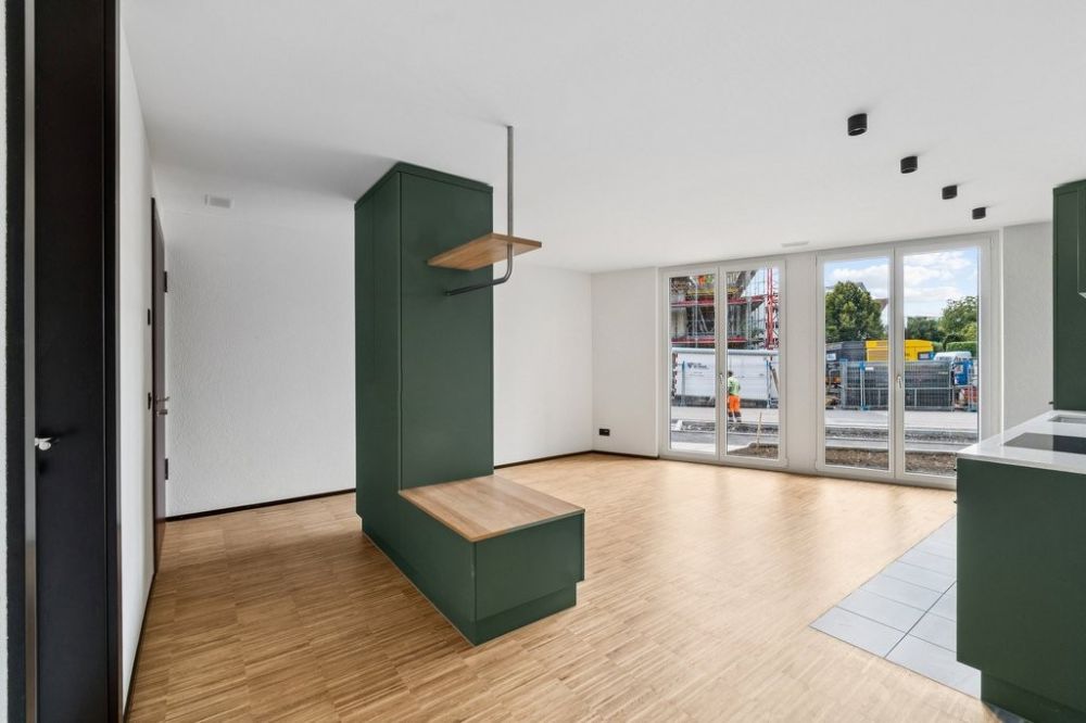 Attraktive und charmante Neubauwohnung mit Sitzplatz an bester Lage - Eingang u. Essbereich