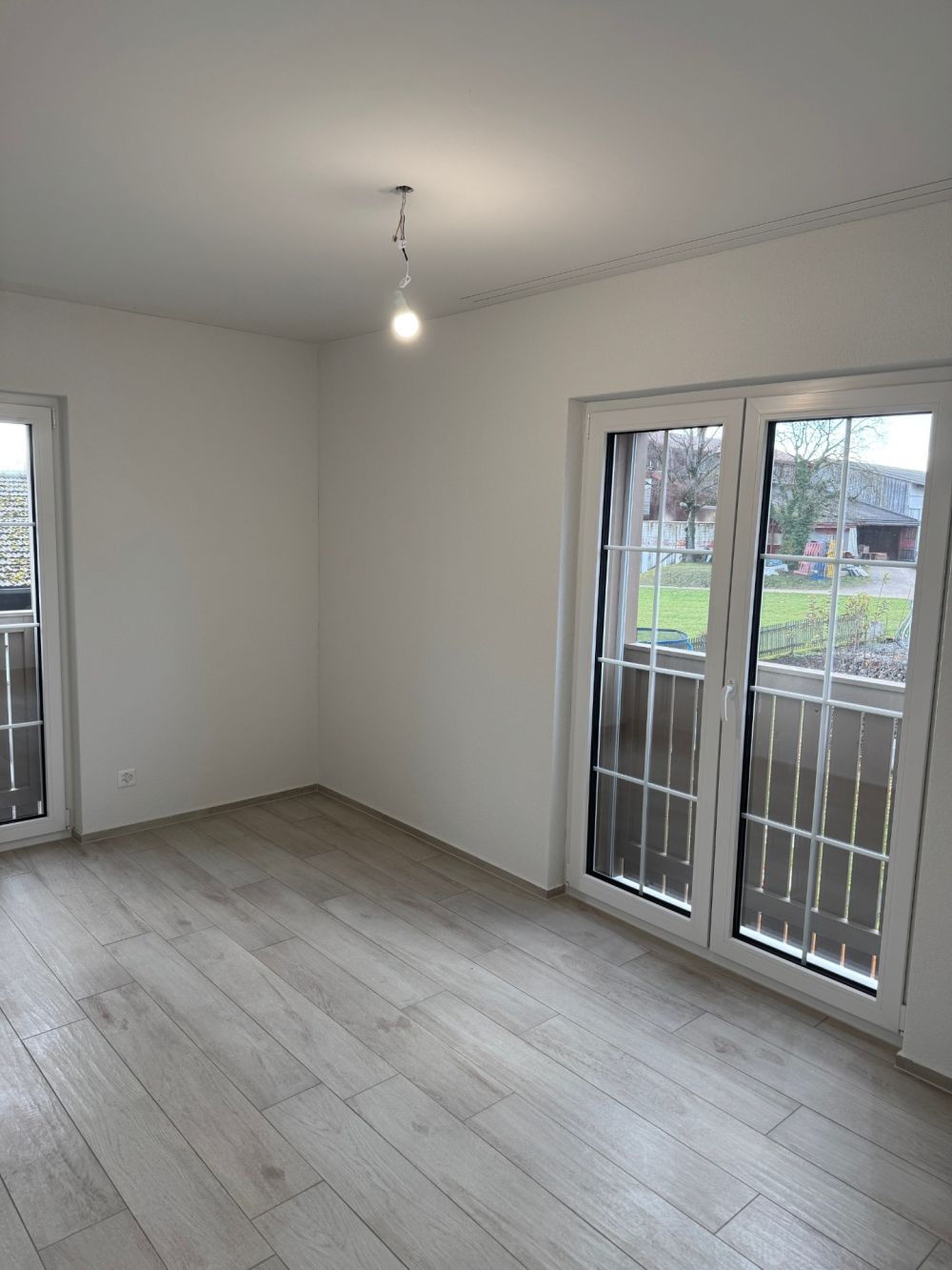 Erstvermietung moderne 3.5-Zimmer-Wohnung - Wohnbereich